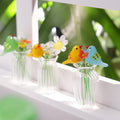 Mundgeblasener Glasstrauß mit Vogelmotiven; die Blüten haben einen Durchmesser von 2,5 bis 3 Zoll.