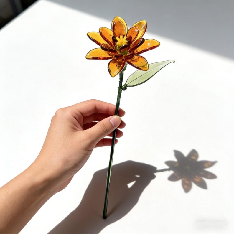 Mundgeblasene Glasringelblume, 20 cm, bernsteinfarben