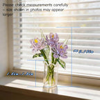 Mundgeblasene Glasschmetterlingsorchidee mit Lotusblatt, handwerkliche Blumenskulptur in Glasvase, elegantes Wohndekor